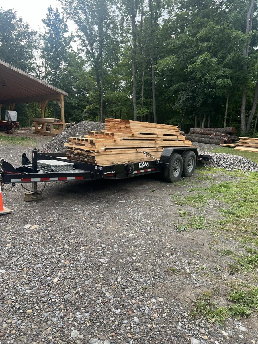 Sawn pine and hemlock beams loaded on a trailer