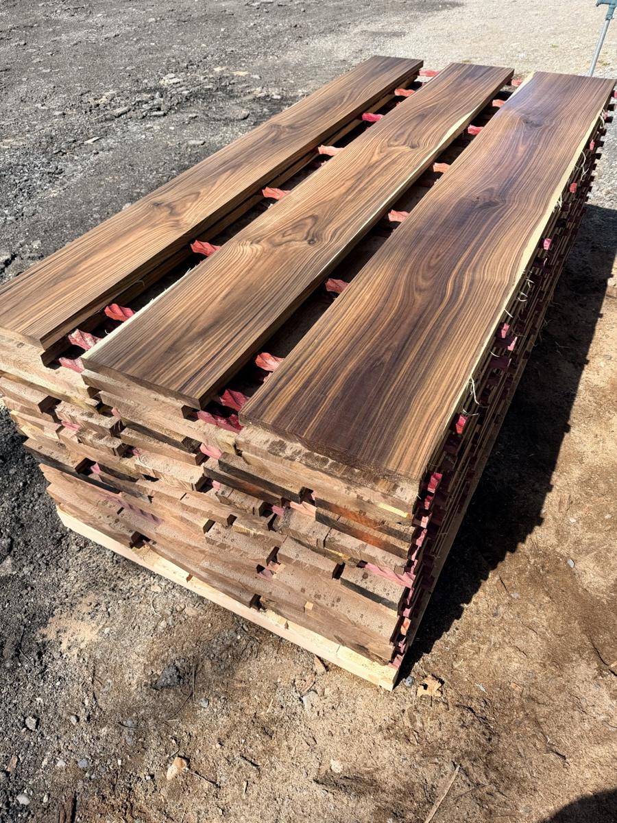 A stack of kiln-dried black walnut lumber